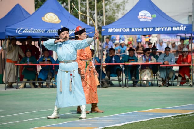 Mongol Naadam woman archery