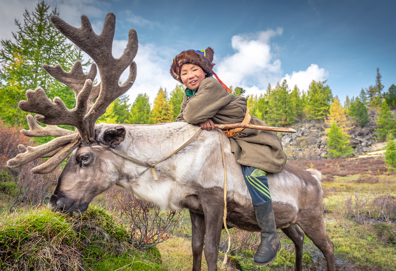 Reindeer taiga boy